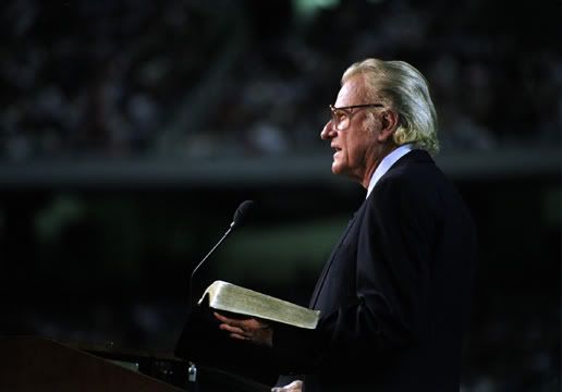 billy graham preaching. illy graham preaching.