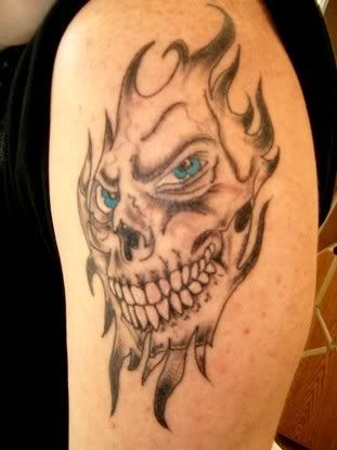 The King of Skull Tattoo Designs