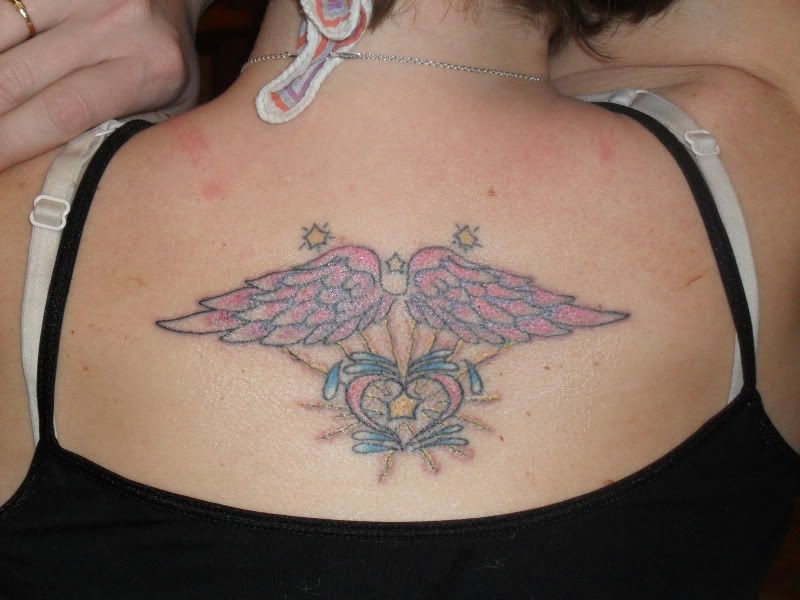 angel wings and heart tattoo