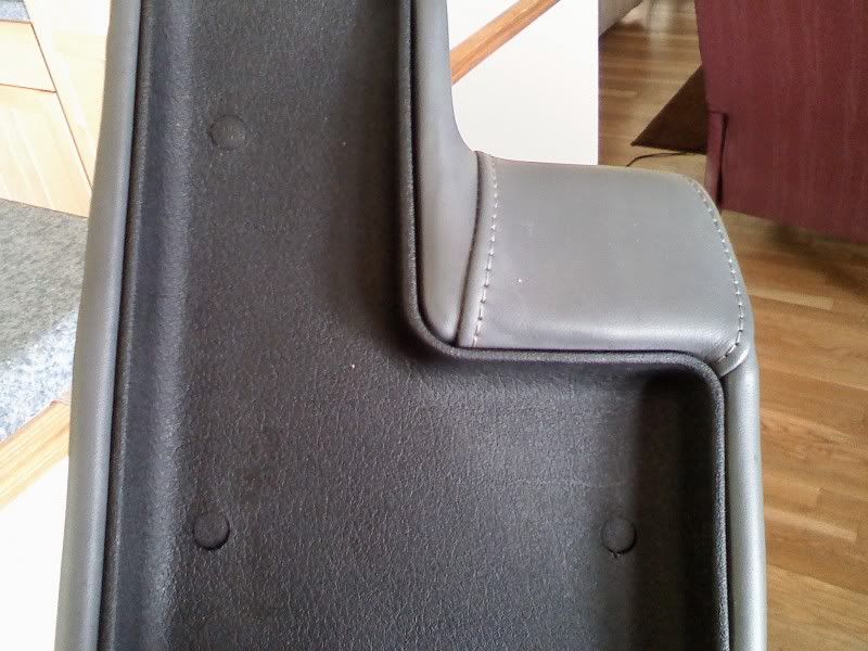 Reupholstering arm rest.