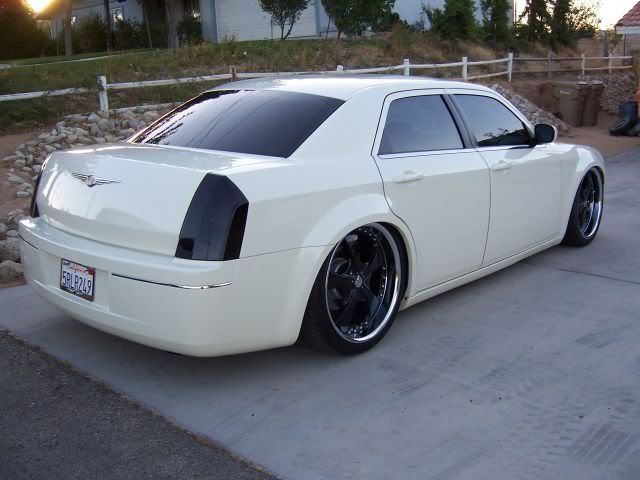 Chrysler 300 Black Rims. I love the lack wheels on my