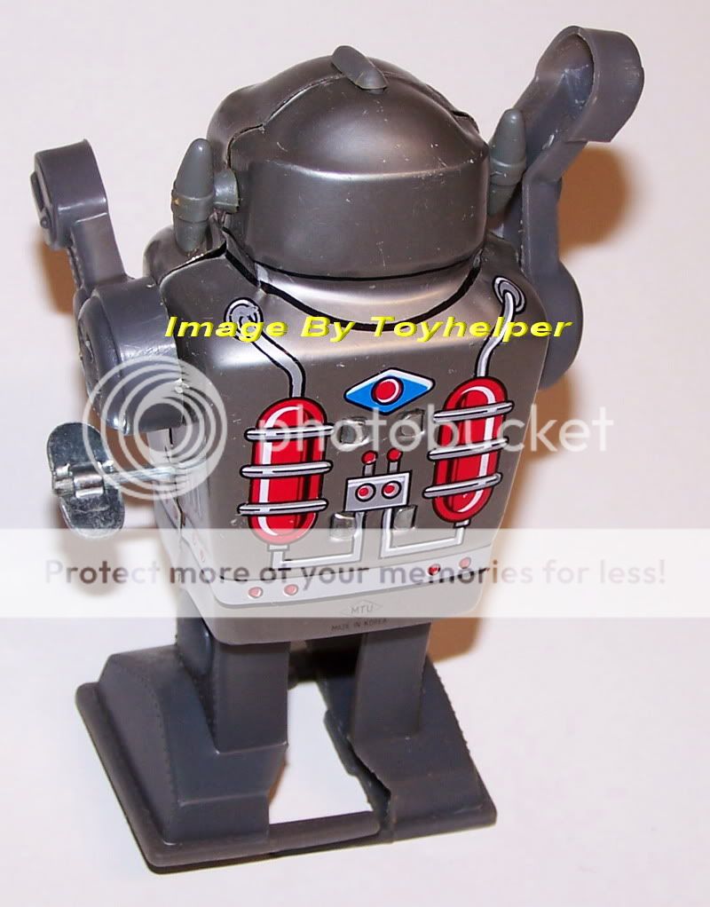 CAPTAIN THE ROBOT MECHANICAL WIND UP SPARKING TOY  
